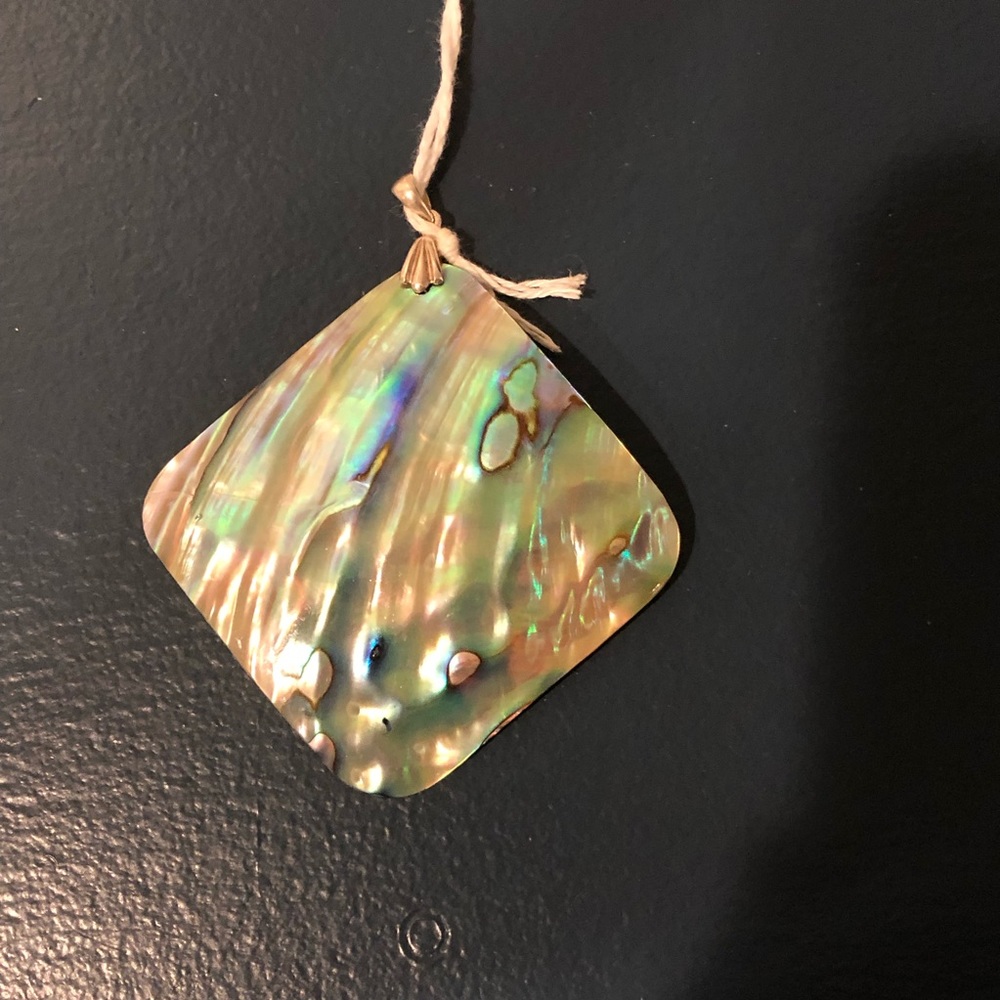 Sterling silver shell 🐚 charm.
